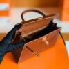 mmexport1673323282146-1024x800-1 Hermes Kelly Barenia Reddish brown Gold Hardware 25cm Full Handmade