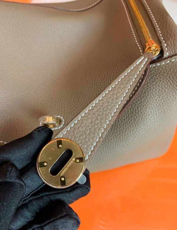 mmexport1678098735060-791x1024-1 Hermes Lindy TC Leather Etoupe Grey Gold Hardware 26cm Full Handmade