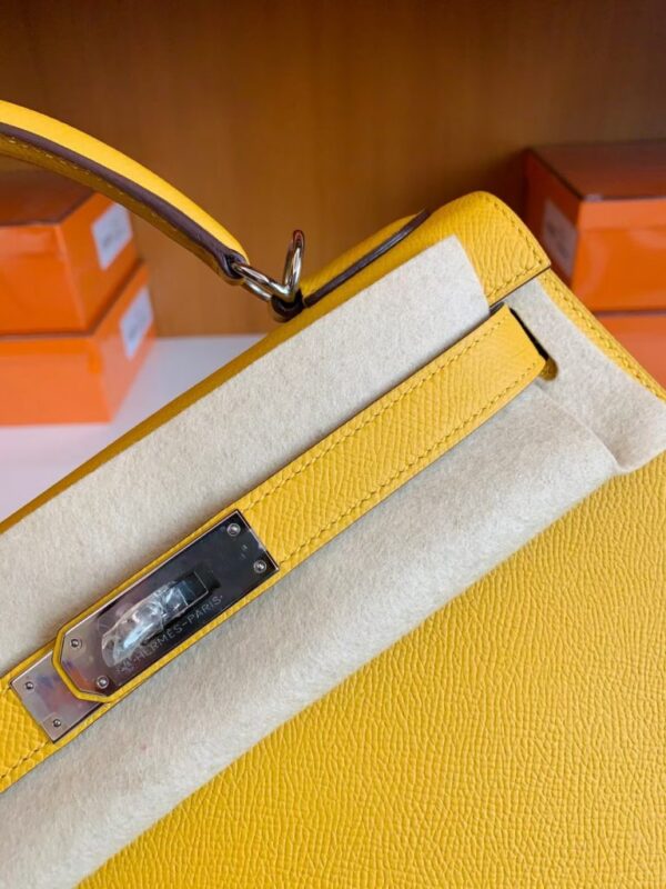 mmexport1679281571167-768x1024-1 Hermes Kelly Epsom 9D Amber yellow Silver Hardware 28cm Full Handmade