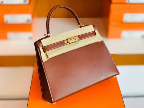 mmexport1699008843513-1024x768-1 Hermès Kelly Barenia Reddish brown Gold Hardware 28cm Full Handmade
